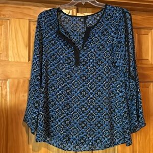 Top with slit at shoulder